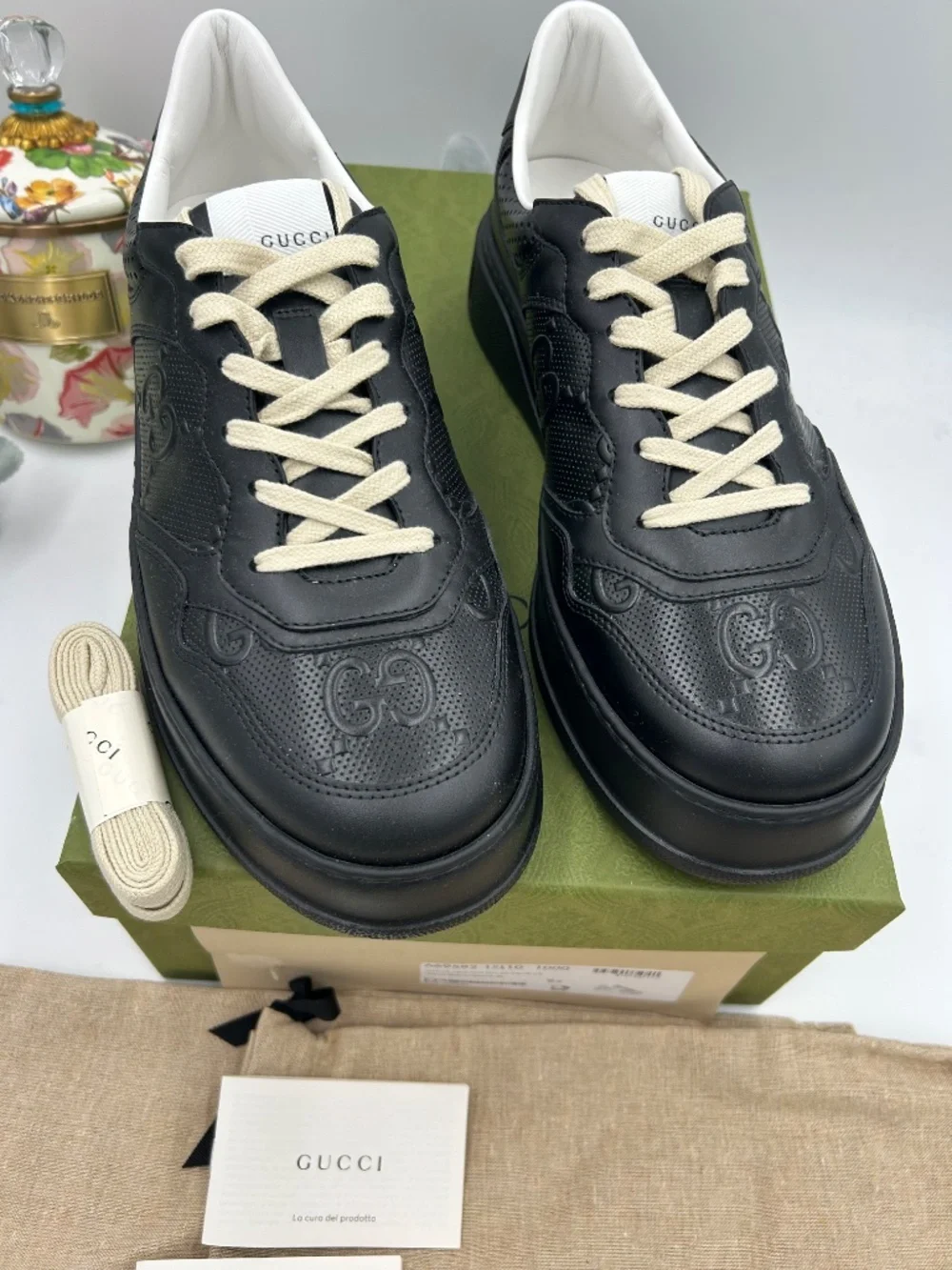 Men’s Gucci GG Embossed Leather Sneakers.  Size 9.5.(fits 10.5). Made in Italy.